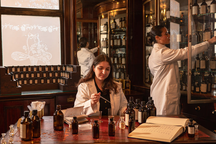 Floris Perfumers mixing perfume at 89 Jermyn Street. 