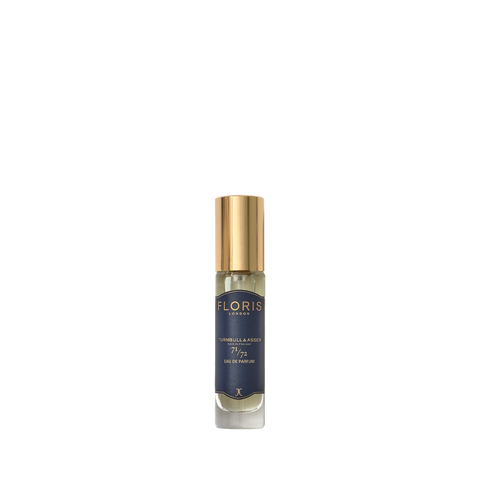 The 71/72 Eau de Parfum by Floris London features a golden cap, dark label with the Floris logo, and offers a captivating vegan fragrance.