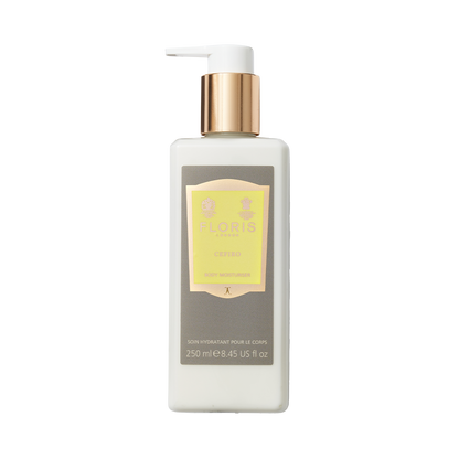 White bottle of Floris London Cefiro – Enriched Body Moisturiser with gold pump and yellow label, enriched with jojoba oil, on a plain background.