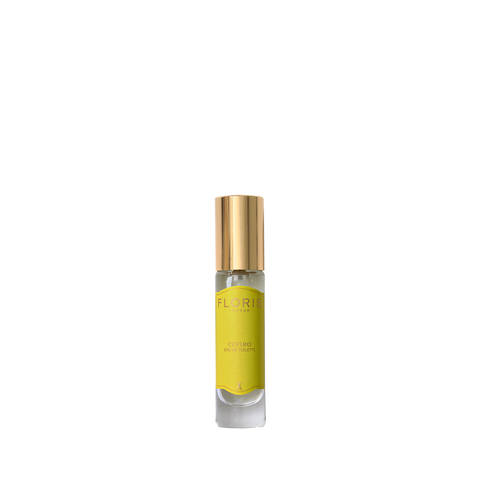 The small yellow-labeled Cefiro Eau de Toilette by Floris London, with a golden cap and citrus notes, sits elegantly on a white background.