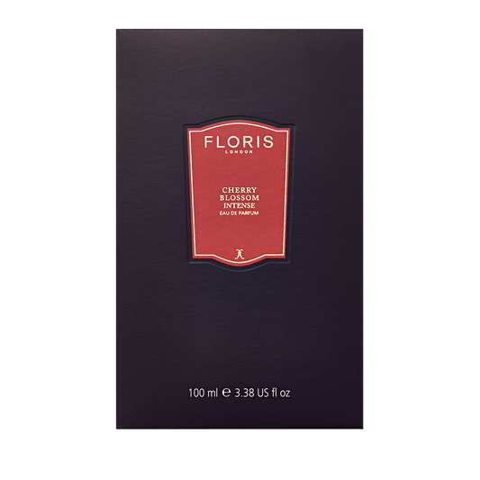 Dark box with a red label: "Cherry Blossom Intense - Eau de Parfum, Floris London, 100 ml," capturing the exquisite essence of spring blossoms.