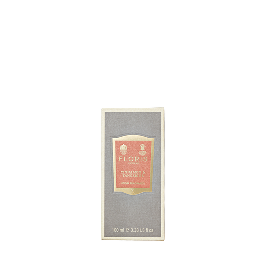 Gray box labeled "Cinnamon & Tangerine - Room Fragrance," 100 ml, by Floris London, with a rich spice blend of amber sandalwood and bright citrus notes.