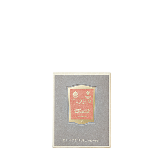 The Floris London Cinnamon & Tangerine scented candle, 175g, blends cinnamon and tangerine with fragrance oils for a delightful aroma.