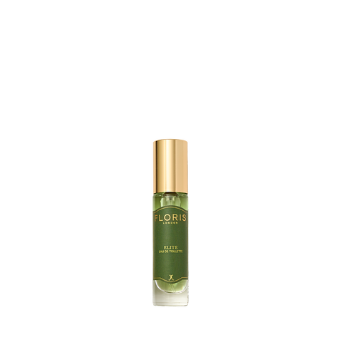 Green and gold perfume bottle labeled "Elite - Eau de Toilette" by Floris London, on a white background, features a vegan fragrance with subtle woody notes.