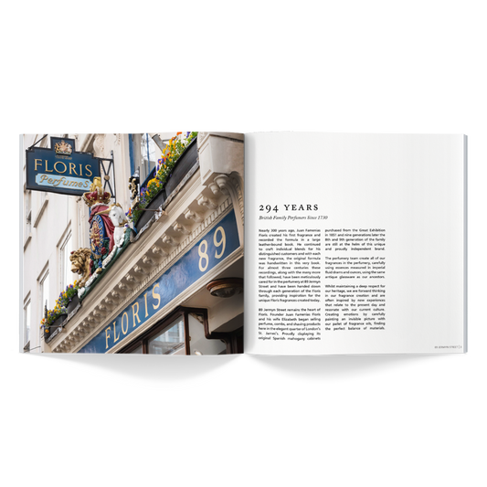 An open booklet showing a photograph on the left page of the Floris store facade with a 'FLORIS Perfumes' sign and the address number 89. The right page has text titled '294 Years' with a subtitle 'British Family Perfumers Since 1730,' providing historical information about the Floris brand.