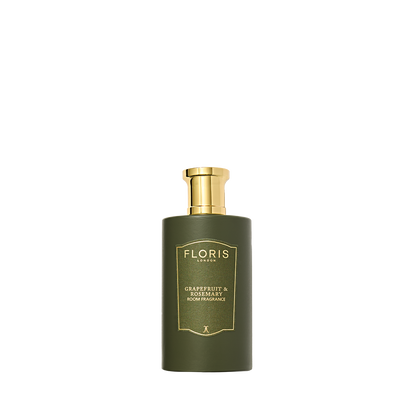 Floris London's Grapefruit & Rosemary room fragrance boasts a green bottle, grapefruit and sandalwood scent, and a gold pump top.
