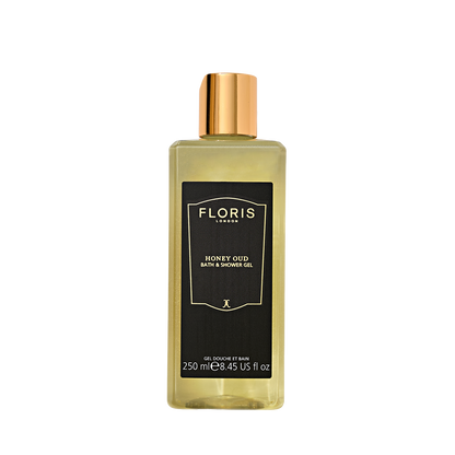Clear 250ml bottle of Floris London UK Honey Oud Bath & Shower Gel with English honey, oud oil, black label, and gold cap.