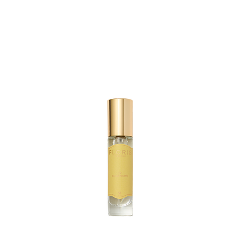JF - Eau de Toilette by Floris London, with a gold cap and yellow label, offers a citrus-woody scent for men, set against a pristine white background.
