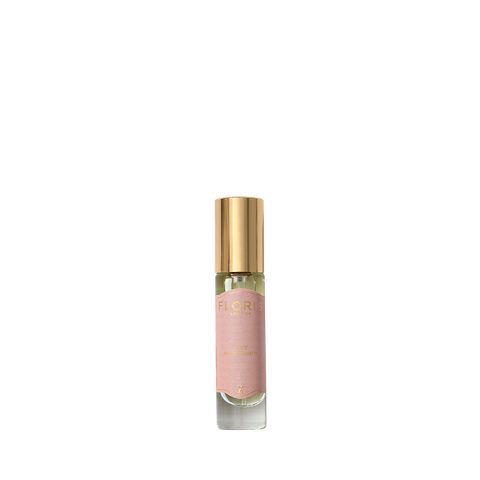 Floris London's Lily Eau de Toilette: a floral fragrance in a gold-capped bottle with a pink label against a white backdrop.
