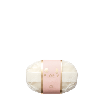 The Floris London Lily - Luxury Soap is a gentle, vegetable-based white bar wrapped in clear plastic with a pink and gold label.