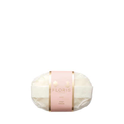 The Floris London Lily - Luxury Soap is a gentle, vegetable-based white bar wrapped in clear plastic with a pink and gold label.