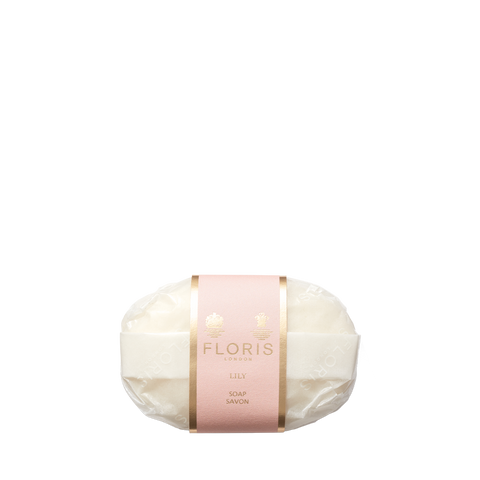 The Floris London Lily - Luxury Soap is a gentle, vegetable-based white bar wrapped in clear plastic with a pink and gold label.