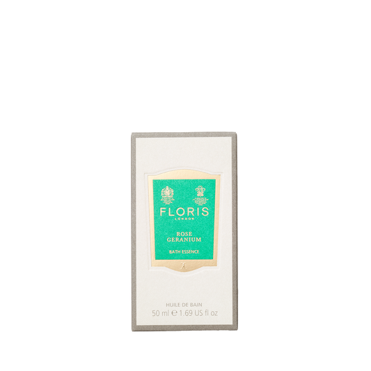 A box labeled "Rose Geranium - Bath Essence" by Floris London, with a green and cream design; a perfume-like bath product offering skin-softening benefits.