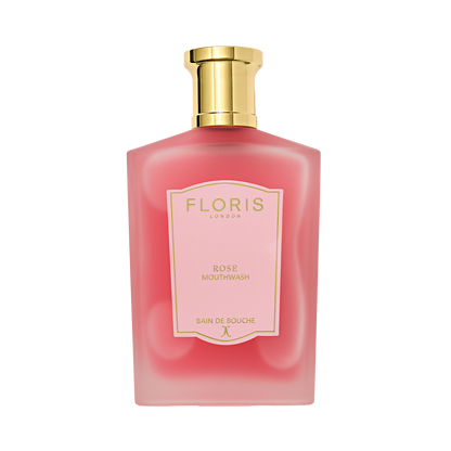 Pink Floris London Rose Mouthwash with a gold cap and light pink label, infused with pure rosewater for an elegant touch.