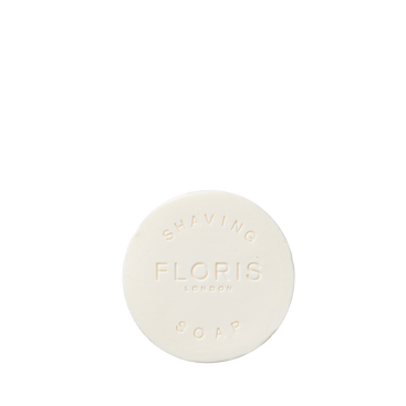 Santal Shaving Soap Refill by Floris London—round, white, nourishing shea butter soap embossed "FLORIS LONDON SHAVING SOAP" on top.