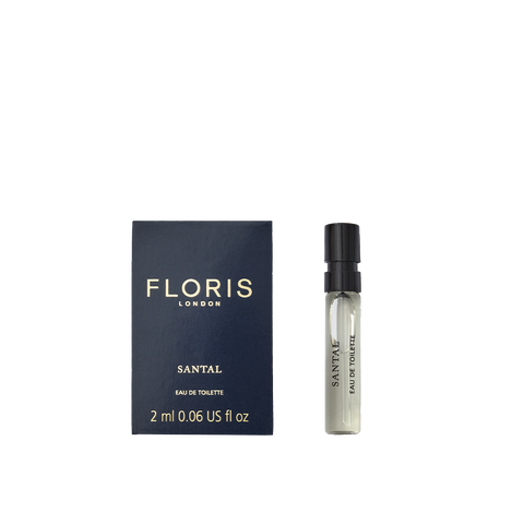 Floris London's Santal Eau de Toilette: a men's sandalwood fragrance in a dark box with gold text and a sleek transparent spray bottle, exuding sophistication.