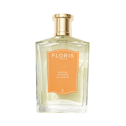 Clear perfume bottle labeled "Floris London Santal Intense - Eau de Parfum" with a gold cap, offering a modern sandalwood fragrance.