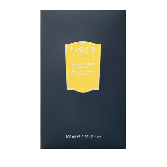 Dark box of Floris London UK Soulle Ámbar Eau de Parfum, 100 ml, featuring a bright amber-yellow label.