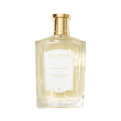 Floris London UK Stephanotis Eau de Parfum in a clear glass bottle with hints of jasmine, gold cap, and label.