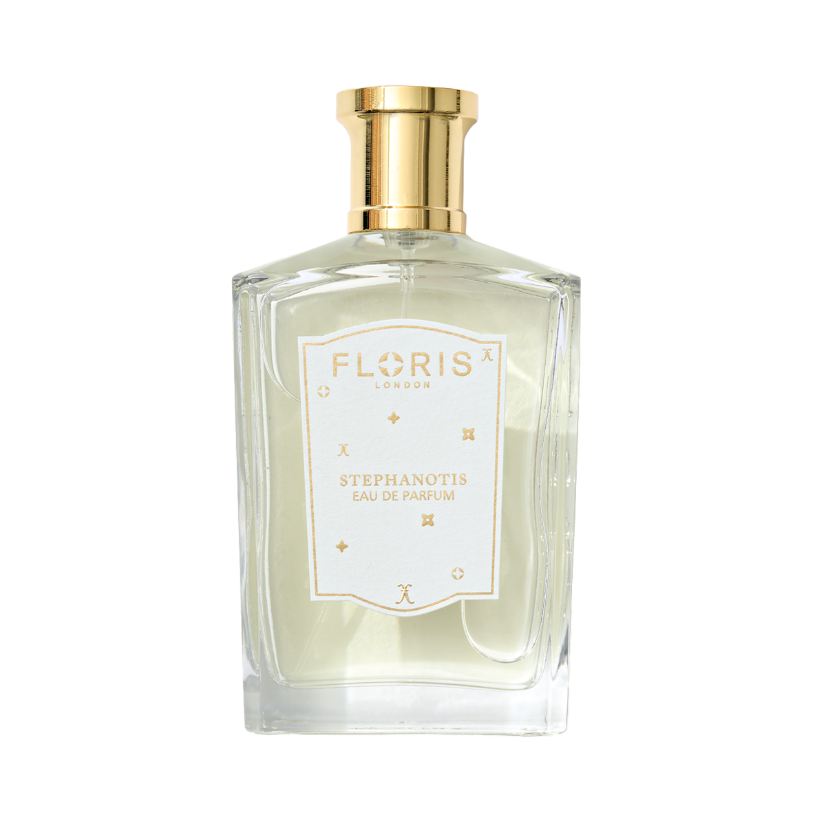 A clear glass bottle of Floris London UK Stephanotis | Limited Edition perfume, with a gold cap, white label, and a delicate floral scent.