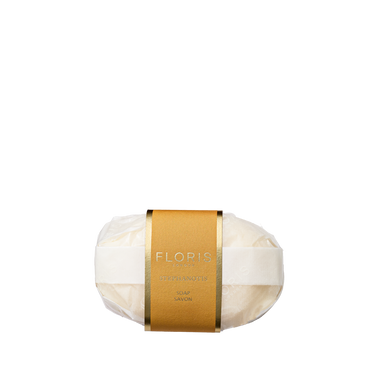 The Stephanotis - Luxury Soap by Floris London is a white, vegetable-based hand soap bar, wrapped in clear plastic with a gold Floris London label.