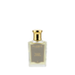 A clear glass bottle of Floris London Tuberose in Silk Eau de Parfum, a floral scent with a gold cap and label.